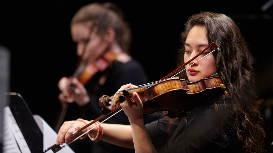 Student playing violin