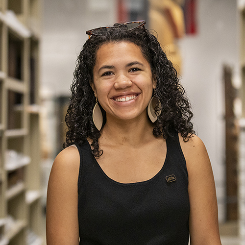 Racquel West in a storage area at the Burke Museum.